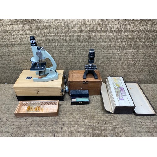 1064 - Prinz optics student microscope model no: 300L and a selection of slides.