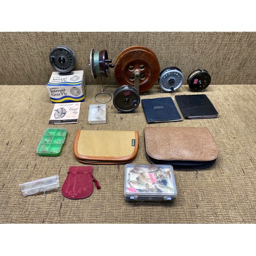 728 - Mixed selection of fishing equipment including intrepid gear fly reel, other reels and a selection o... 