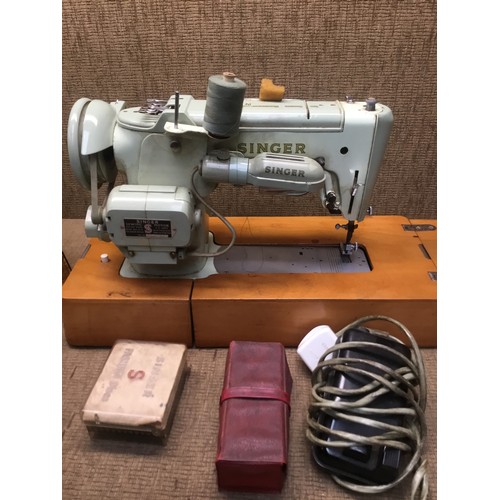 128 - Vintage Singer sewing machine model number 320K with accessories