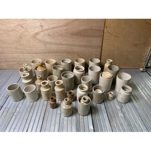 136 - A quantity of old glazed storage jars and pots