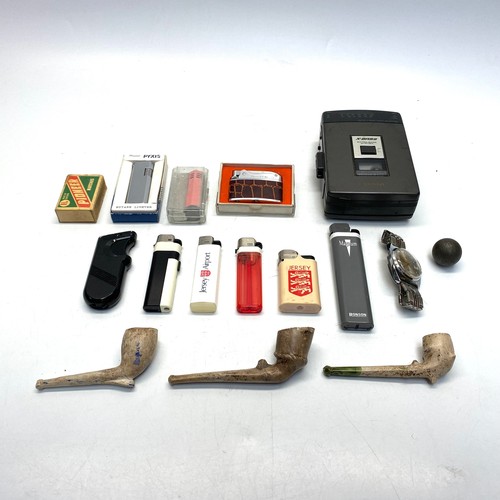 733 - Collection of vintage lighters and curiosities.