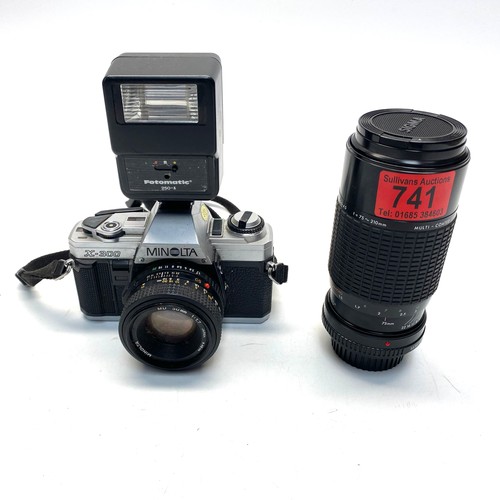 741 - Minolta X-300 camera with sigma ZOOM-K III, 75 - 210mm.