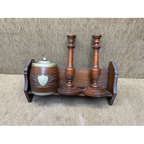 1086 - Collection of treen including: Biscuit barrel, 2 candle stands and a book stand.