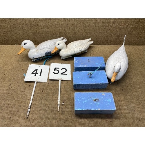 173 - Decoy ducks with weights (3) and two metal number stake garden signs.