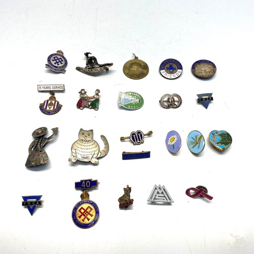 889 - Vintage enamel badges including some silver.