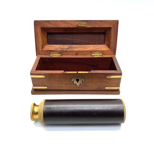 920 - Brass and leather telescope in a lovely wooden presentation box.