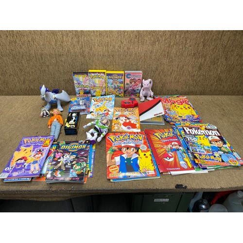 205 - mixed children toys including Pokémon and Digimon.