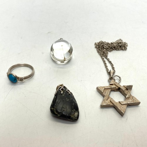 915 - Silver items, Turquoise ring size H. Two pendants and a star of David cross and chain.