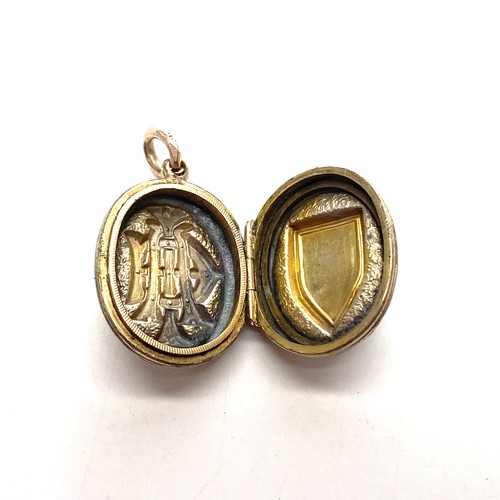 921 - Gold locket (no hallmarks tests as gold MYOMU) 5.1g