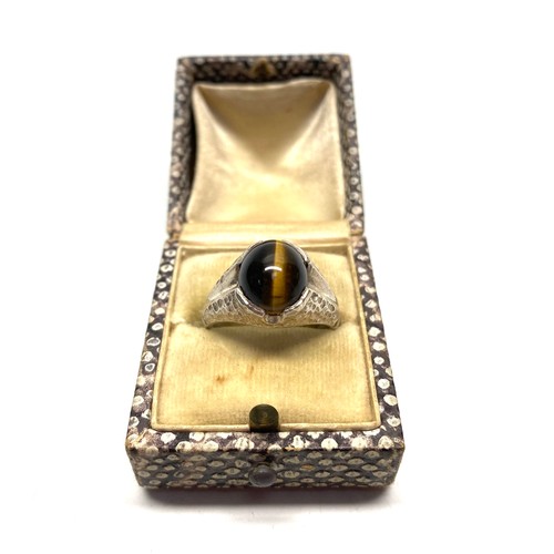 909 - Tigers eye sliver ring size T.