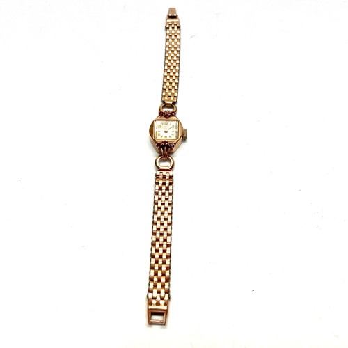 912 - 14ct Rose gold ladies watch with ruby mounted stones to the shoulders. by DROZ (later became Jaquet ...