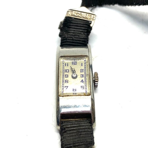 923 - 18ct white gold ladies watch.