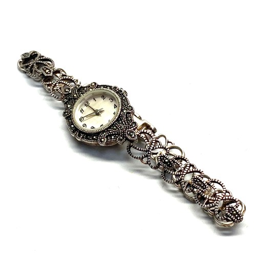 932 - Sterling silver past times ladies cocktail watch.