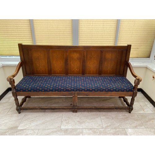 1109 - Vintage settle with upholstered seat and carved arms 189cm