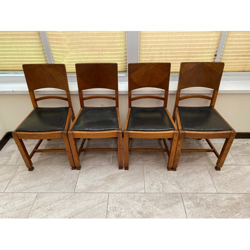 208 - Four wooden chairs with black leather seat base