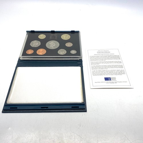 941 - 1996 UK Royal Mint Proof Coin Collection 9 Coin Year Set In Blue Case includes £5 with COA.