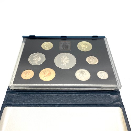 941 - 1996 UK Royal Mint Proof Coin Collection 9 Coin Year Set In Blue Case includes £5 with COA.