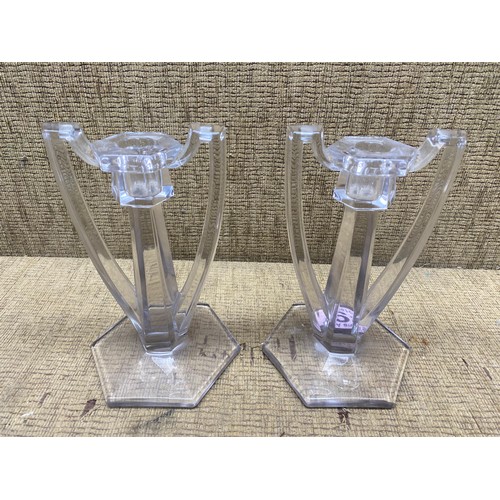 496 - Pair of glass candle sticks.