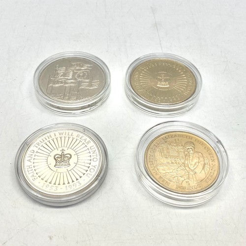 951 - Four collectible £5 coins.