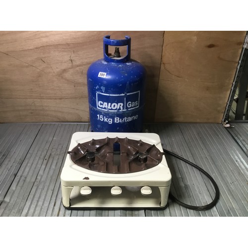 300 - Vintage calor gas two ring cooker with grill and a 15kg gas bottle approx half full