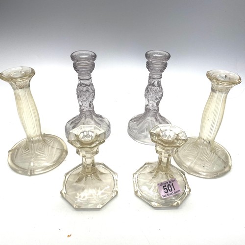 501 - Three pairs of glass candlesticks