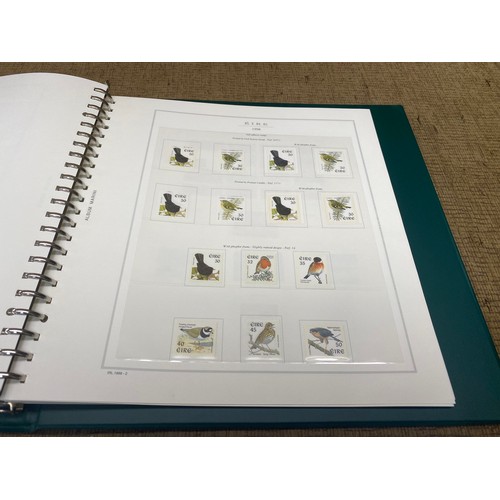 787 - Three Marini deluxe stamp collection folder with various stamps and booklets from Ireland/Eire.