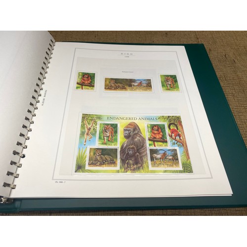 787 - Three Marini deluxe stamp collection folder with various stamps and booklets from Ireland/Eire.