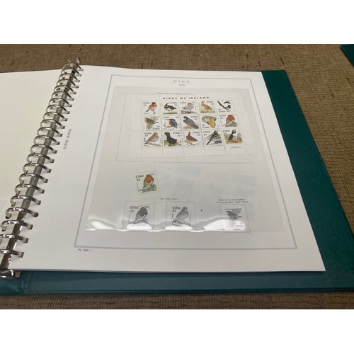 787 - Three Marini deluxe stamp collection folder with various stamps and booklets from Ireland/Eire.