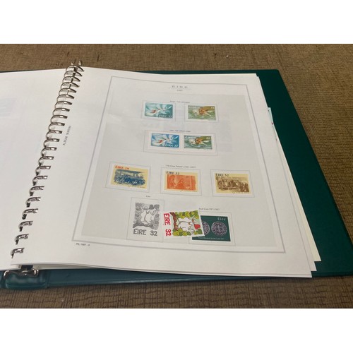 787 - Three Marini deluxe stamp collection folder with various stamps and booklets from Ireland/Eire.