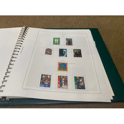 787 - Three Marini deluxe stamp collection folder with various stamps and booklets from Ireland/Eire.