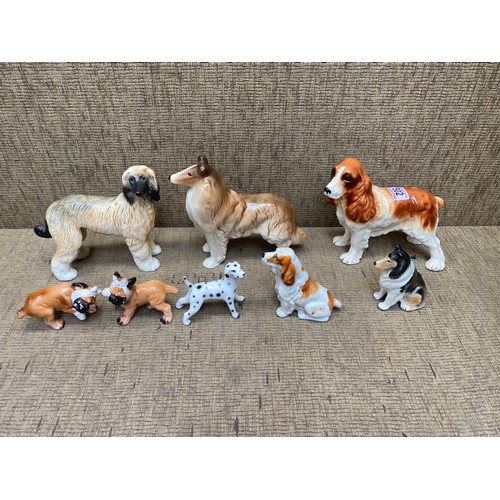 502 - collection of ceramic dogs including copper craft.