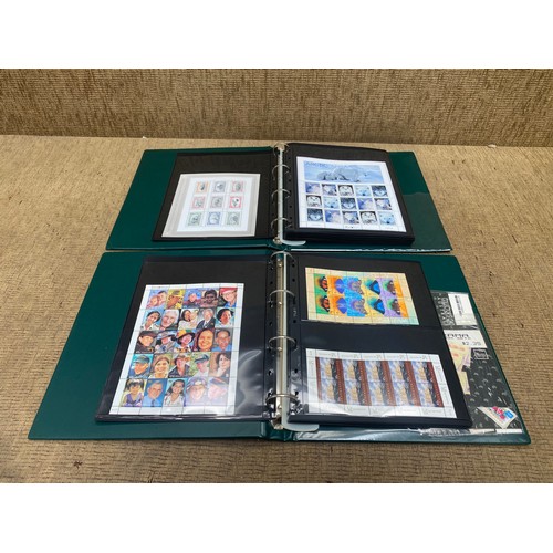 793 - Two deluxe tamp albums full of world stamps in mint condition.