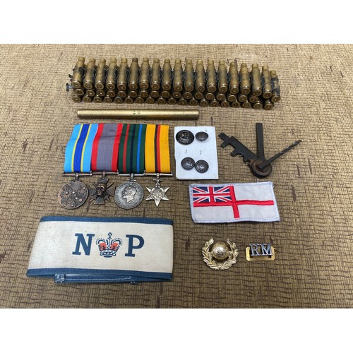 964 - Collection of Militaria including: Bullet Belt, Medals and arm bands.