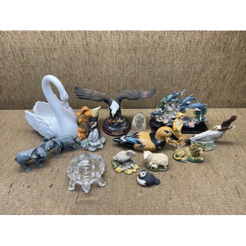 403 - Mixed selection of boarder fine arts style resin animal ornaments.