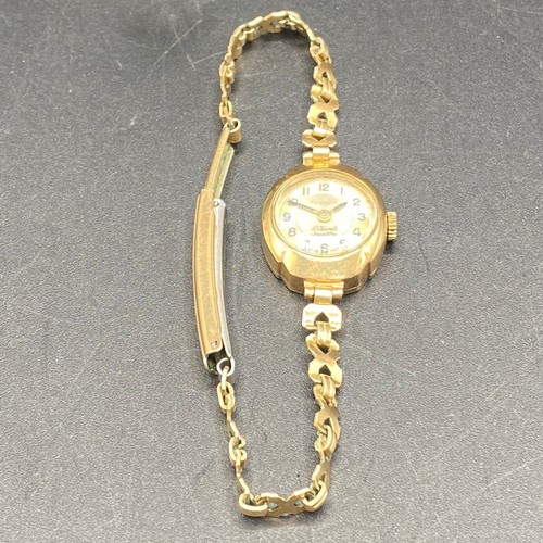 805 - 9ct gold ladies 17 Jewel Swiss made watch by Everite. Rolled gold strap (not running).