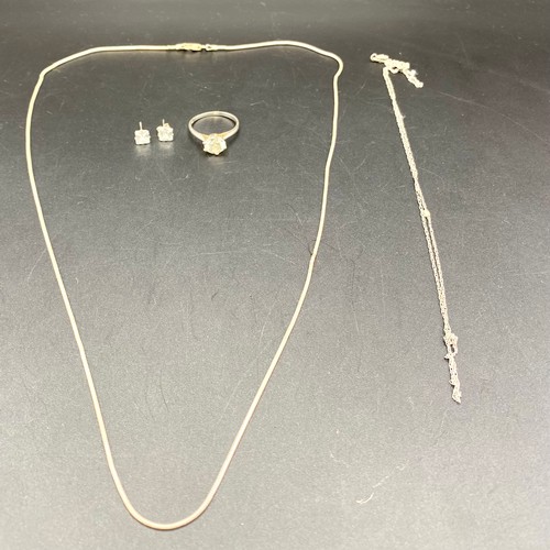 812 - Silver ring size P, pair of silver and Australian Crystal earrings, and two silver necklaces.