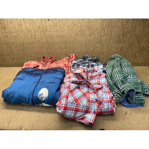 73 - Selection of flannel jackets and fleece jackets.