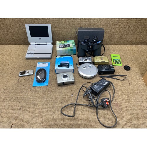 82 - Mixed items including: Portable DVD player, Cassette player and a Samsung PL221 digital camera.