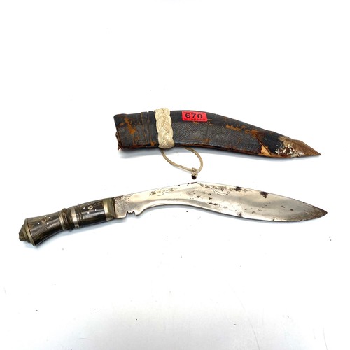 670 - Kukri knife with sheath.