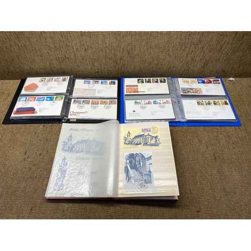 1056 - two folders of first day covers and one folder of Belgium first day covers.