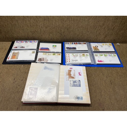 1056 - two folders of first day covers and one folder of Belgium first day covers.