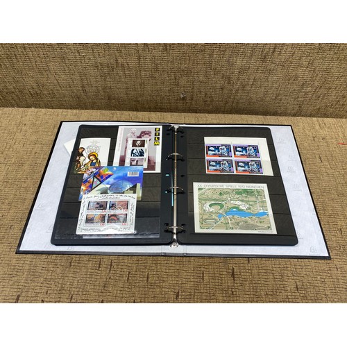 1057 - large folder of world stamps and mini sheets.