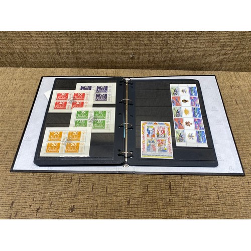 1057 - large folder of world stamps and mini sheets.