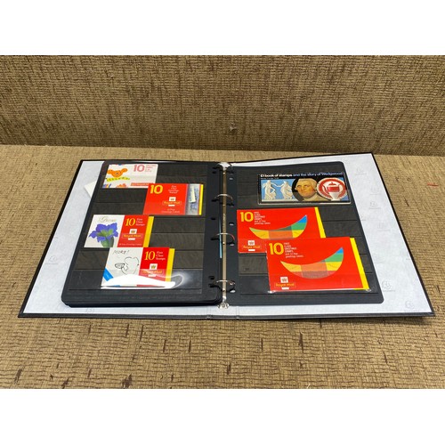 1057 - large folder of world stamps and mini sheets.