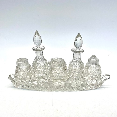 421 - Crystal condiment set.