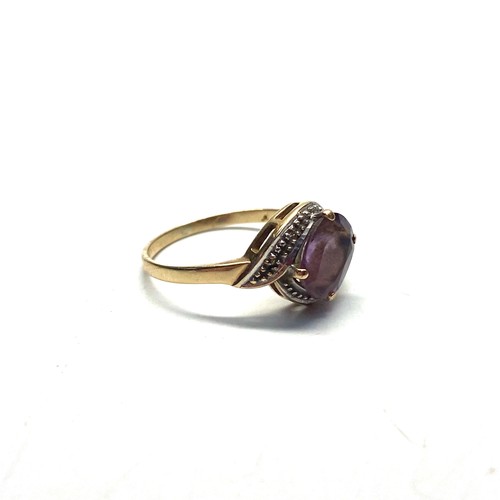 826 - 9ct gold ring with amethyst stone and diamond shoulders, Size Q, 2.2g.