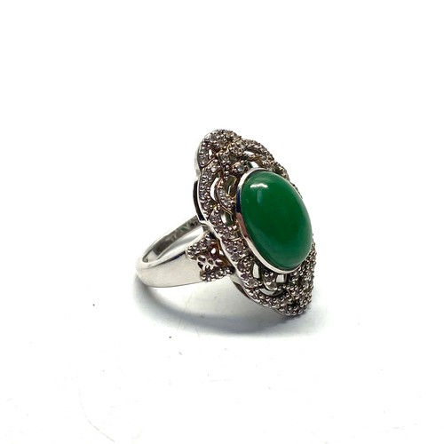 832 - Stunning double-mounted silver ring with Jade stone and diamond surround. Made by TJC. size T.