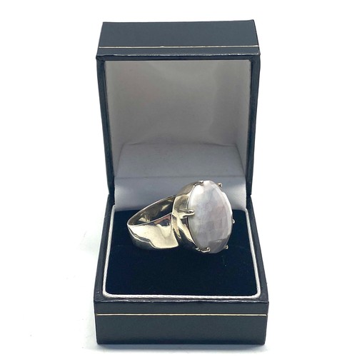 840 - Handmade Silver ring and box stamped .925 with chequered moonstone. Size R.