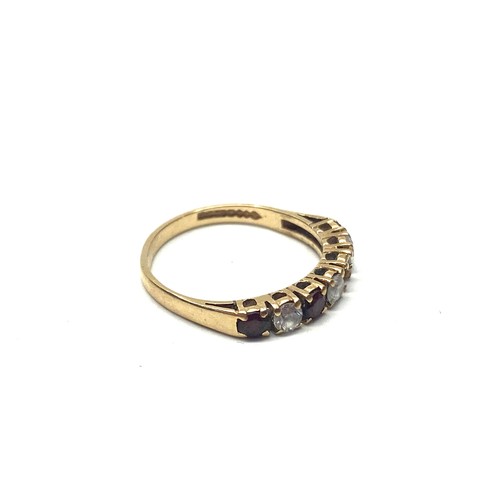 845 - 9ct gold ring with CZ stone 1g size G.