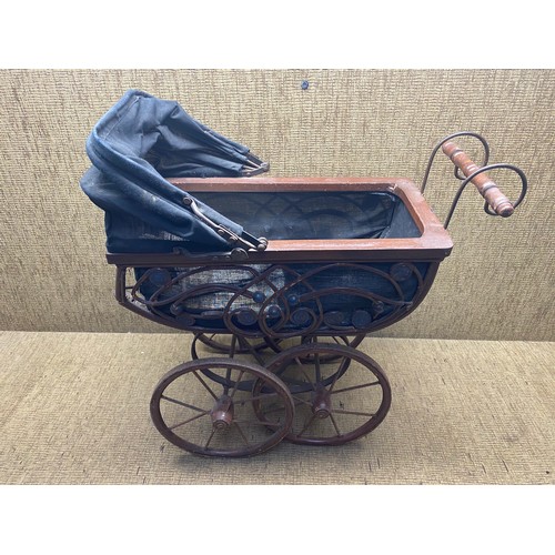 1097 - Vintage bent wood rattan iron baby doll carriage.